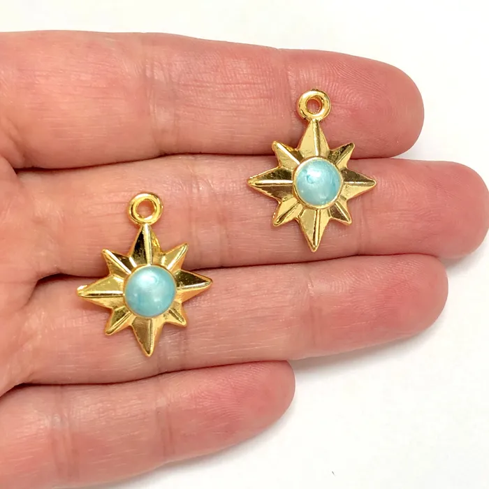Earrings Peppy Beads 24Kt Gold Plated Enamelled North Star Charms 2 pcs in a pack Earrings Peppy Beads 24Kt Gold Plated Enamelled North Star Charms 2 pcs in a pack