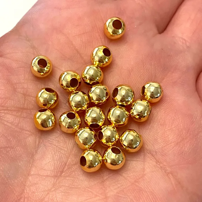 Earrings Peppy Beads 24Kt Shiny Gold Plated 6mm Spacer Balls 100 pieces in a pack Earrings Peppy Beads 24Kt Shiny Gold Plated 6mm Spacer Balls 100 pieces in a pack
