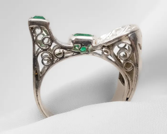 Isadoras C Rings Retro Diamond and Emerald Platinum Ring