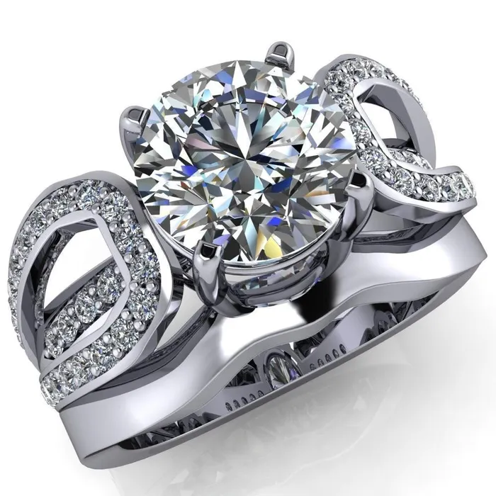 Fire Brilliance Rings Brenda Round Center Stone Split Shank Diamond Channel Under Bezel Engagement Ring Fire Brilliance Rings Brenda Round Center Stone Split Shank Diamond Channel Under Bezel Engagement Ring