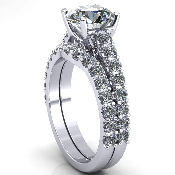 Fire Brilliance Rings Chiara Round Center Stone Diamond Accented Preset Peg Setting with Prong Set Diamond Shoulder Ring