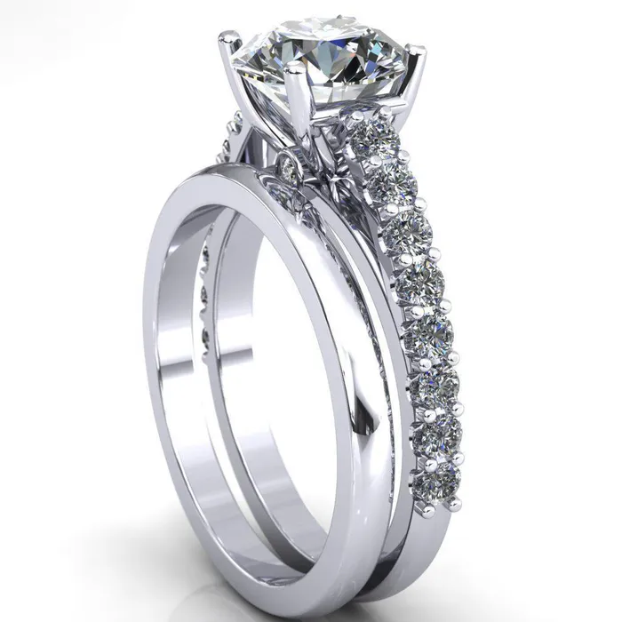Fire Brilliance Rings Chiara Round Center Stone Diamond Accented Preset Peg Setting with Prong Set Diamond Shoulder Ring