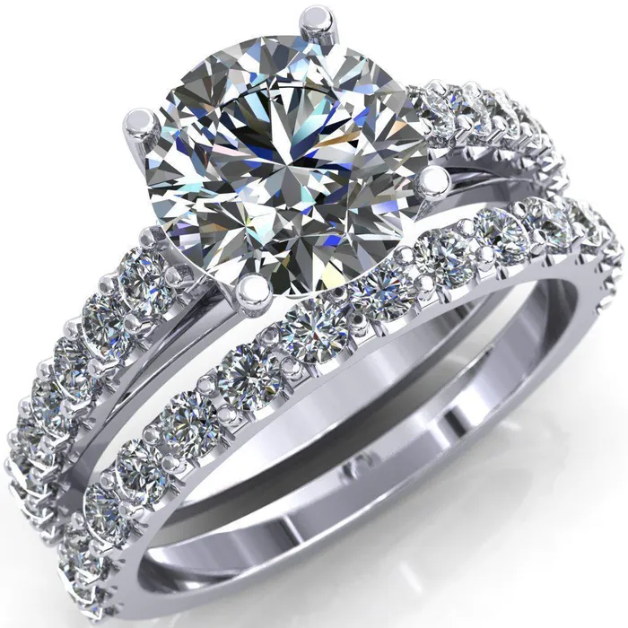 Fire Brilliance Rings Chiara Round Center Stone Diamond Accented Preset Peg Setting with Prong Set Diamond Shoulder Ring