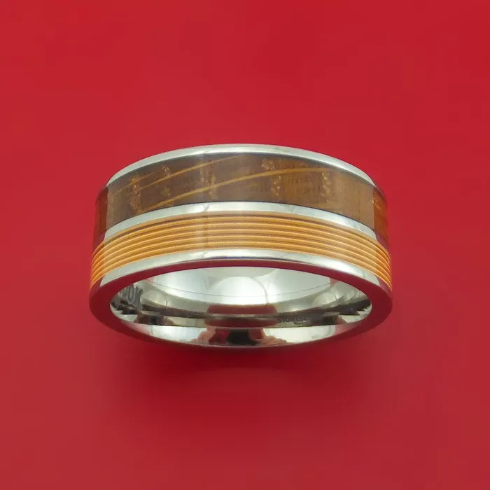 Lashbrook Titanium Ring with Guitar String and Whiskey Barrel Wood Inlays Custom Made Band Rings Lashbrook Titanium Ring with Guitar String and Whiskey Barrel Wood Inlays Custom Made Band Rings