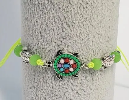 polly Bracelets B124 Green Bead Turtle Cord Bracelet