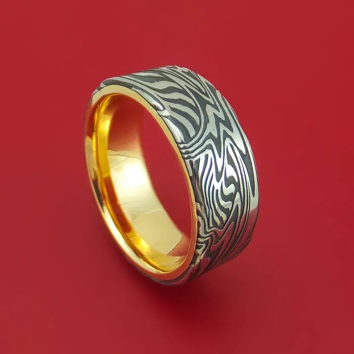 Rings Sunset Kuro Damascus Steel Band with 14K Yellow Gold Sleeve Custom Made Lashbrook Rings Sunset Kuro Damascus Steel Band with 14K Yellow Gold Sleeve Custom Made Lashbrook