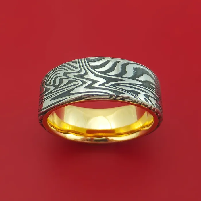 Rings Sunset Kuro Damascus Steel Band with 14K Yellow Gold Sleeve Custom Made Lashbrook Rings Sunset Kuro Damascus Steel Band with 14K Yellow Gold Sleeve Custom Made Lashbrook