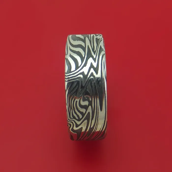 Rings Sunset Kuro Damascus Steel Band with 14K Yellow Gold Sleeve Custom Made Lashbrook Rings Sunset Kuro Damascus Steel Band with 14K Yellow Gold Sleeve Custom Made Lashbrook