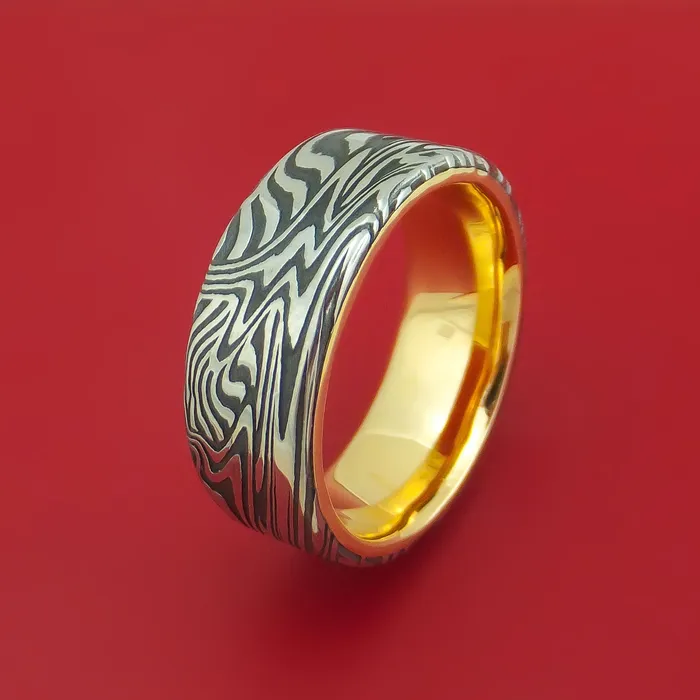 Rings Sunset Kuro Damascus Steel Band with 14K Yellow Gold Sleeve Custom Made Lashbrook Rings Sunset Kuro Damascus Steel Band with 14K Yellow Gold Sleeve Custom Made Lashbrook